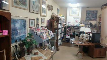 Artwork and merchandise inside the shop