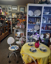 Lamps, tables, and furniture display